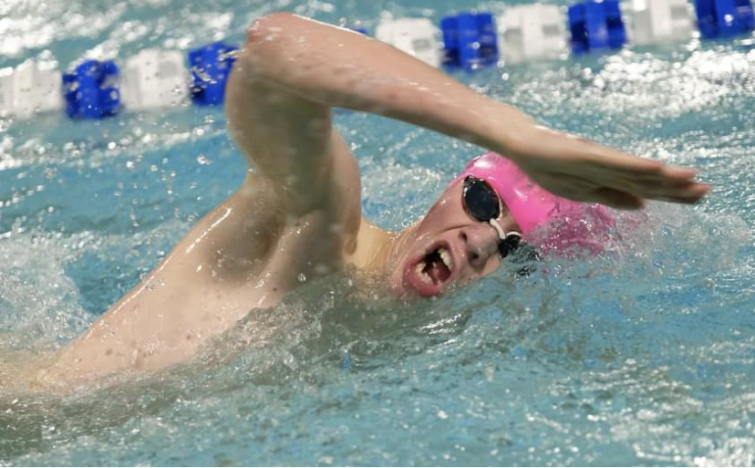  Senior Kyler Warren swims freestyle at the conference meet in Douglas. Warren placed sixth in the 100 meter freestyle and tenth in the 200 meter freestyle.