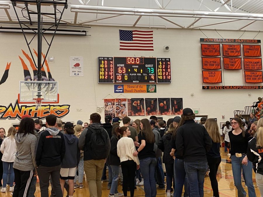 Fans and players alike celebrate the Panthers’ 73-63 victory March 4 over the Worland Warriors to seal PHS’ place in the 2022 3A State Championship.