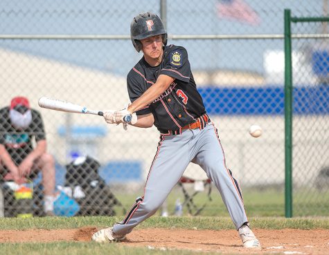 PHS senior Keaton Rowton takes a swing from the batters box during the 2021 season. Rowton is one of two seniors on the Pioneers.