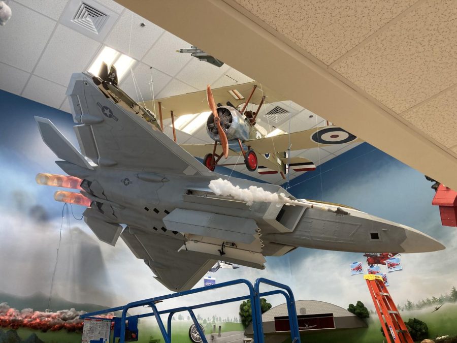 PHS students have been creating the F-22 Raptor throughout the school year. It hangs in one of the highschool pods around the corner of the art room. 