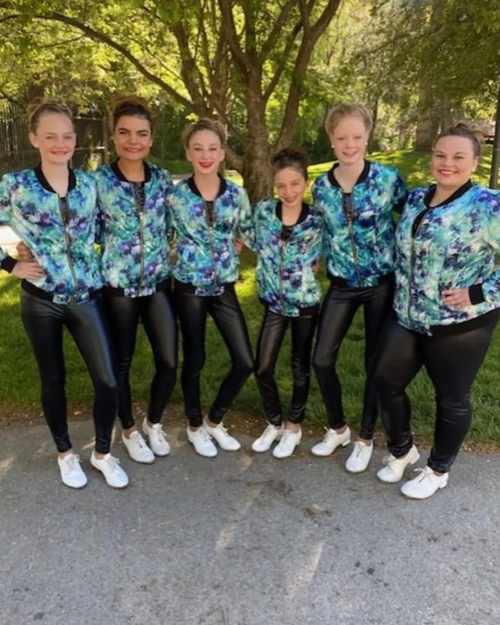 AMT Explosion gets ready to perform the first dance of the day at Lagoon Amusement Park.