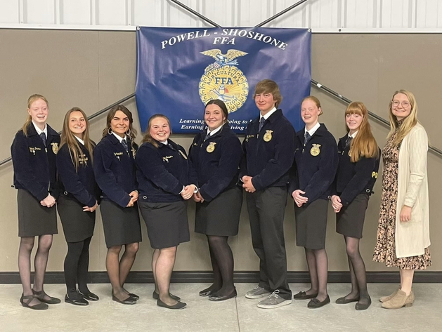 +The+2022-2023+Powell-Shoshone+chapter+officers+stand+alongside+adviser+Mrs.+Shannon+Darrough+after+being+installed+at+the+annual+FFA+banquet+May+3.+