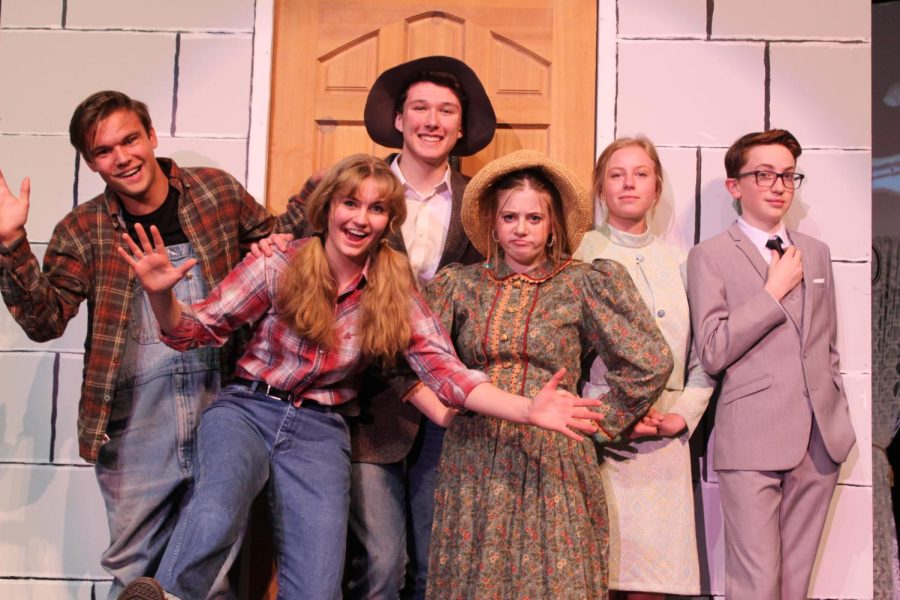From left, seniors Jace Bohlman and Dakota Hansen, sophomores Joe Bucher and Allie Gilliat, junior Hannah Sears, and freshman Paul Cox pose as their characters in the upcoming school musical: The Beverly Hillbillies