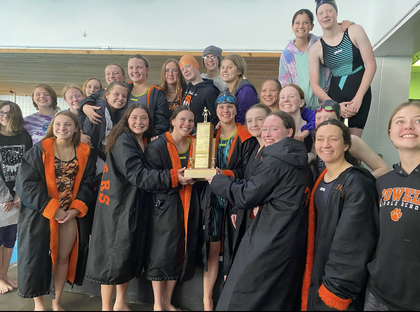 The+Lady+Panther+Swim+and+Dive+stands+on+the+podium+with+the+trophy+after+winning+the+East+Absaraka+Conference+Championship+for+the+second+year+in+a+row.+%0A