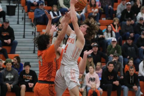 Junior Brock Johnson goes for layup against a Worland player on Feb. 10. The Panthers came up short falling to the Warriors 43-60.
