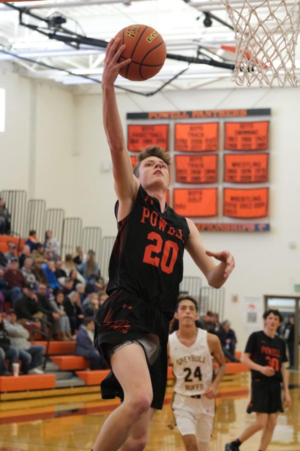 Senior Jace Hyde goes up for a layup in a game against Greybull. The Panther basketball team placed third at the 3A West Regional competition in Mountain View.
