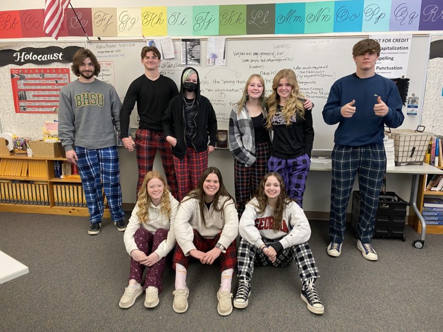 The Prowl staff pose for a picture while wearing pajama pants as a social experiment.
