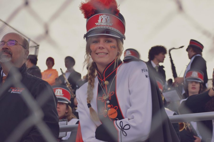 PHS Senior and Drum Major Hannah Sears smiles into the lens whilst eagerly waiting for the start of the Homecoming Football game. 