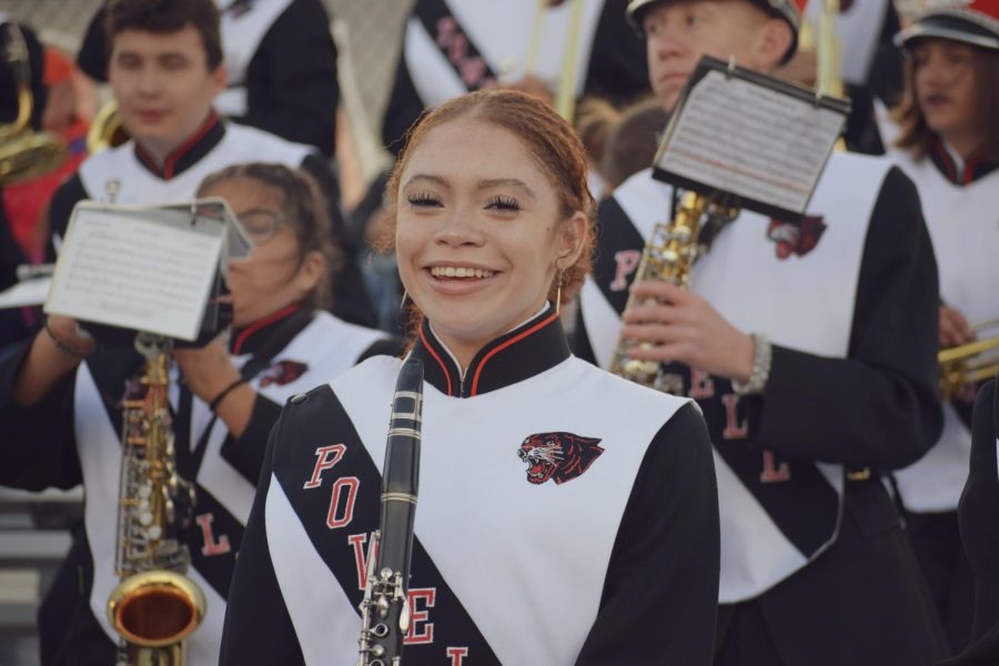 PHS Junior Amiya Love smiles to the camera, giving herself a break before getting ready to play the Panther FIGHT song for the crowd.
