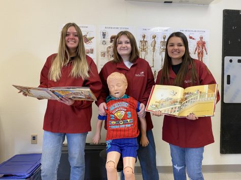 SkillsUSA competitors sophomore Ava Stearns, junior Elle Wilson, and sophomore Kendal Eden show their new jackets to wear in this years competition.