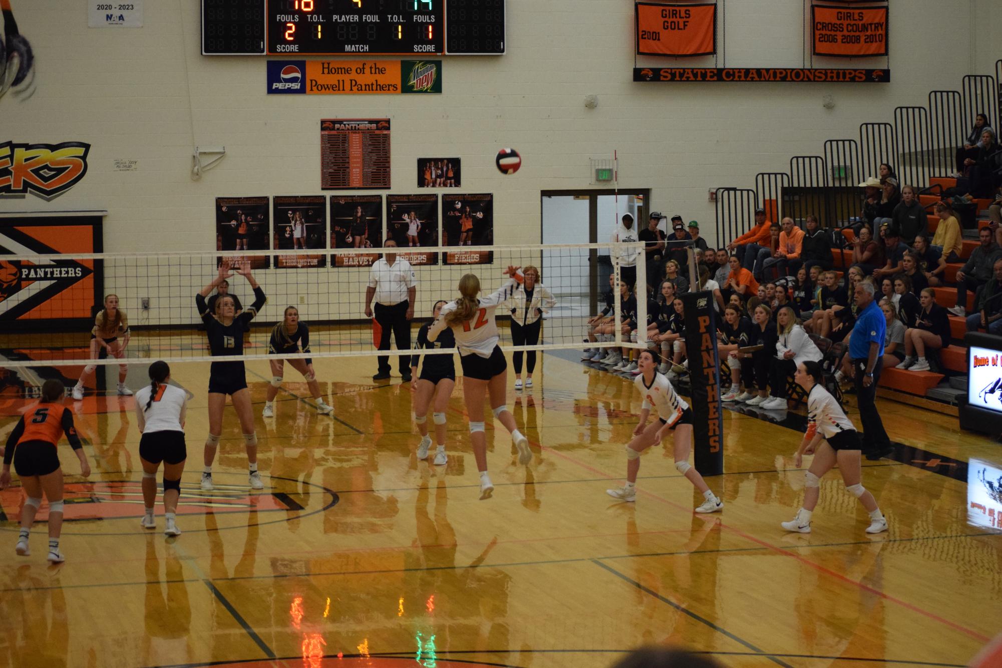 The Lady Panther volleyball team sets up the ball to lead them to a historic win against rival team, the Cody Fillies back in October.