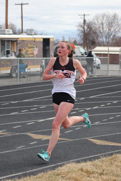 Junior Kinley Cooley running at the Lovell track meet last year. Cooley holds school records in numerous events and cross county but was unable to acquire the coveted title of WyoPreps Student of the Athlete. 
