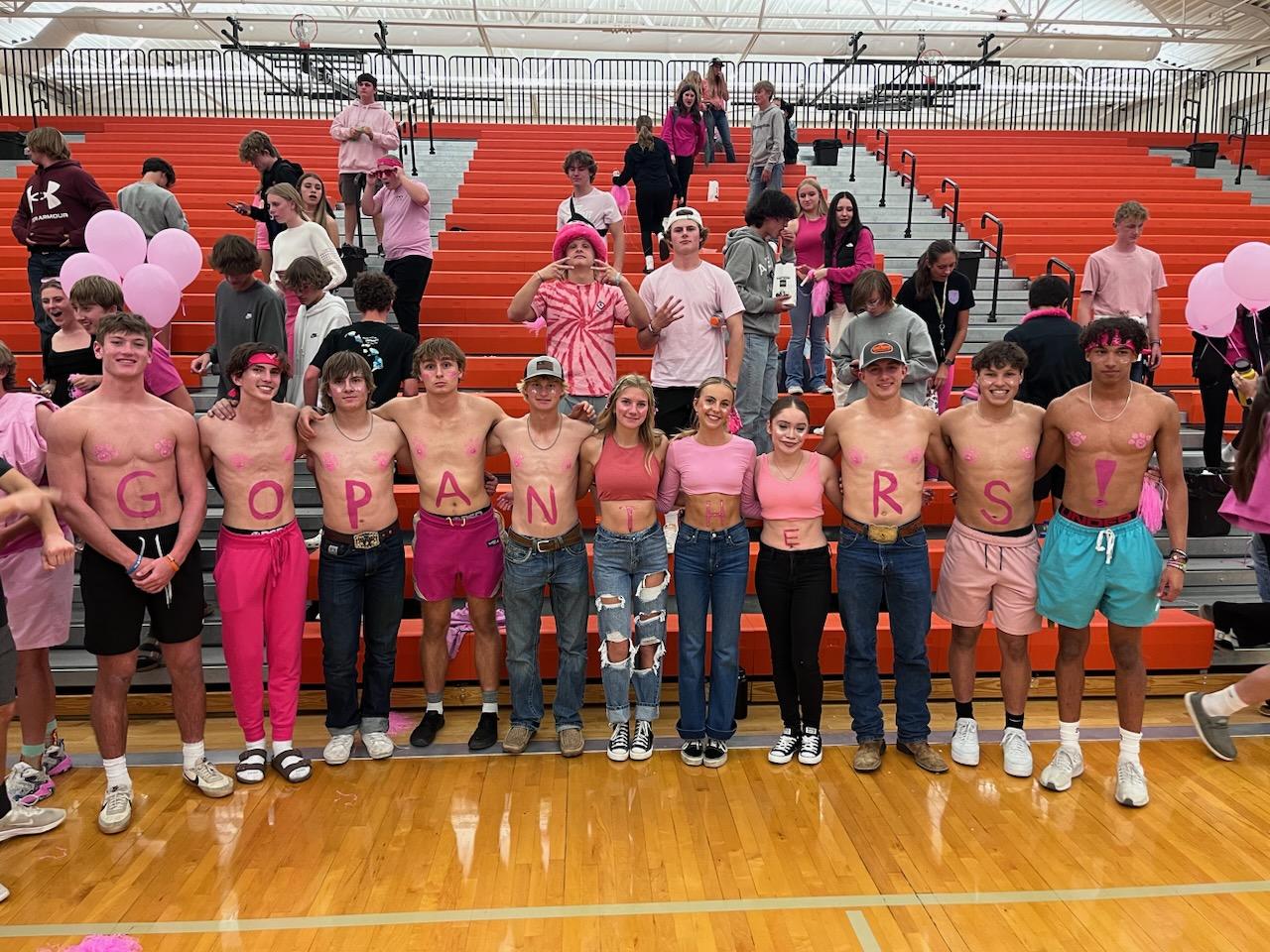 After the volleyball game, the painted-up students smile for a picture. Photo courtesy of Anna Smith.