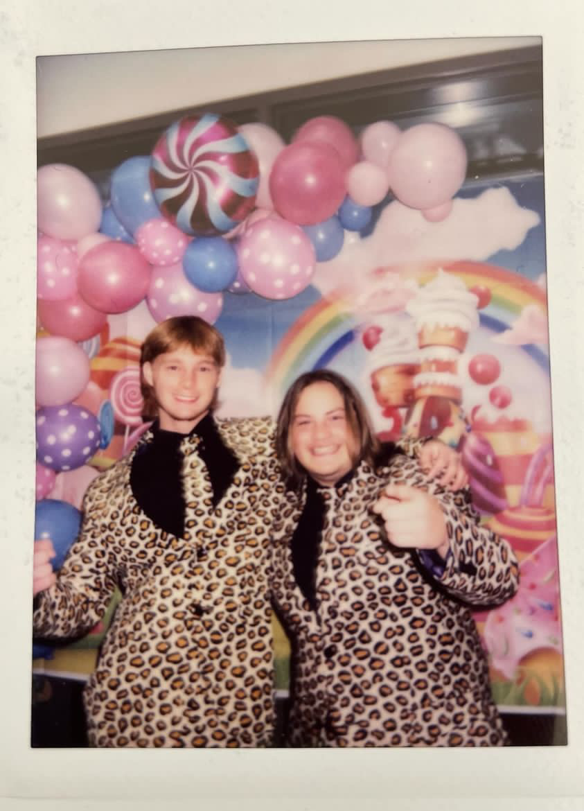Rydr Keefer and Jeremy Harms rock their cheetah print suits while they pose at Winter Formal. 