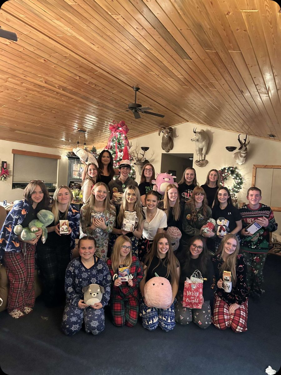 The PHS cheer team enjoys their Christmas party earlier this month. 