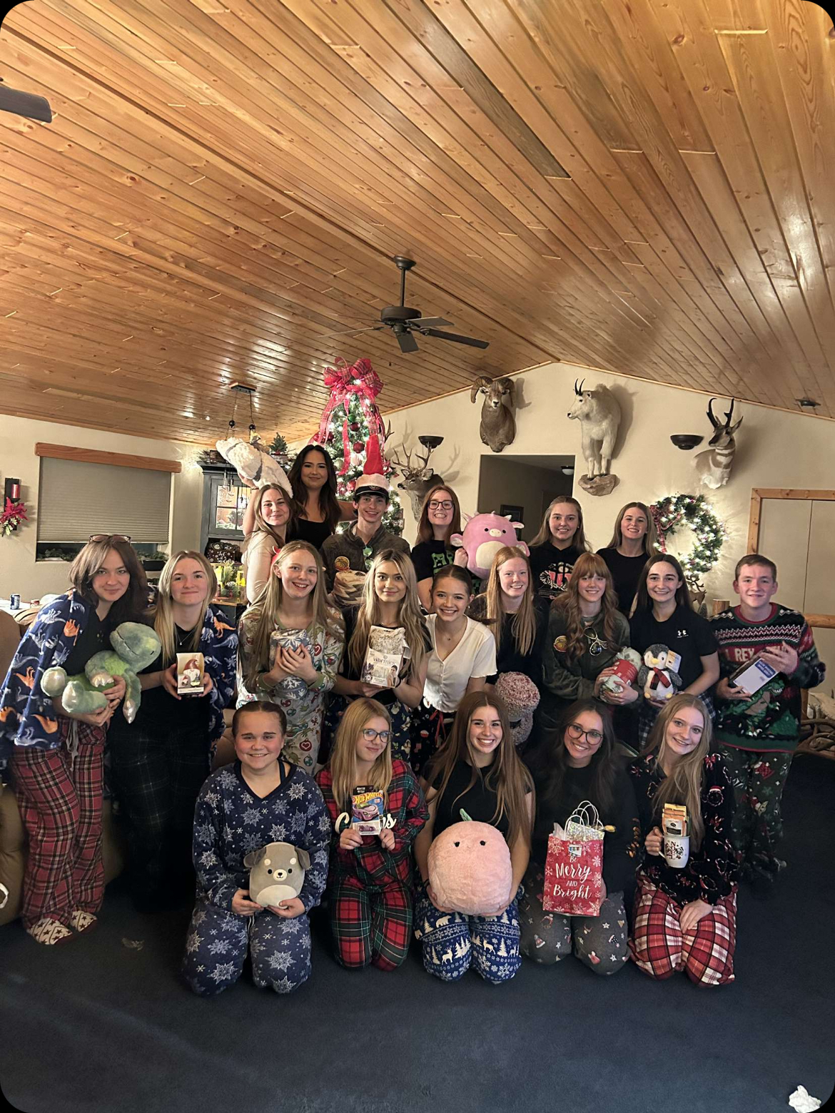 The PHS cheer team enjoys their Christmas party earlier this month. 