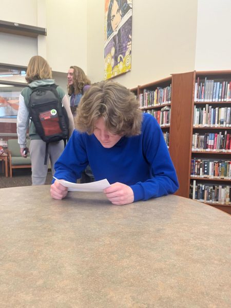 Bryson Weddell, a sophomore LD debater, works on refining his argument.