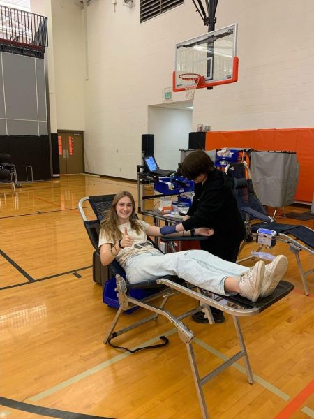 Junior Salem Brown donates blood at the blood drive sponsored by NHS.