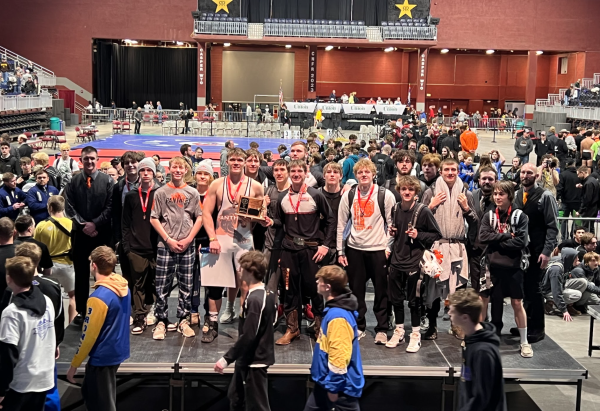 The 2023-2024 Wrestling team stands together for one last time, after winning their fourth place title at the State Championship in Casper the first week in March.