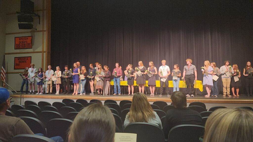 Current National Honors Society members introduce new inductees to the program.