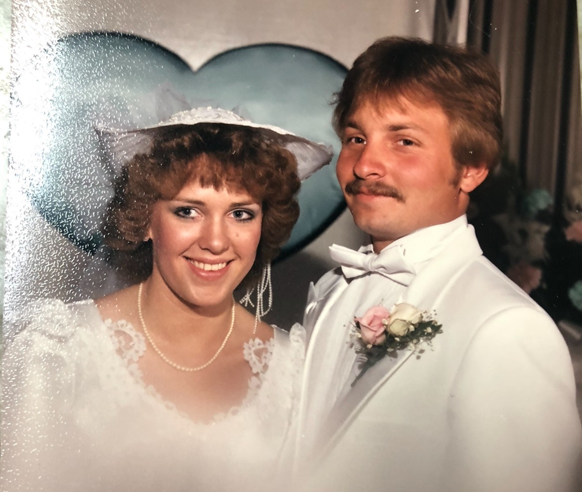 Crystal and Dennis Eden pose for their wedding photos in 1985.