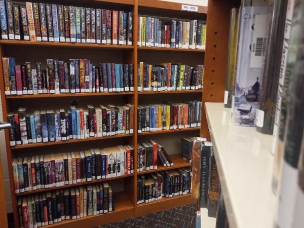 The library at Powell High School holds many cool books for flowering readers.