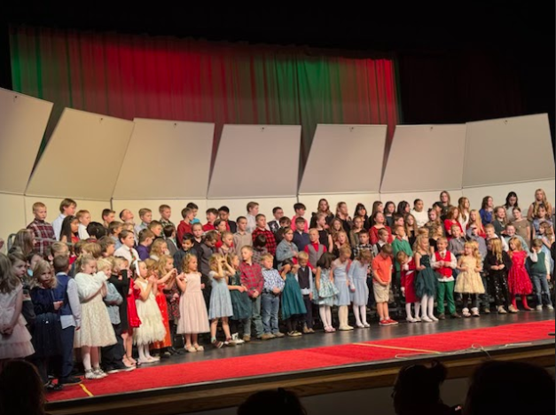 Westside Elementary school students gather as they sing festive songs.