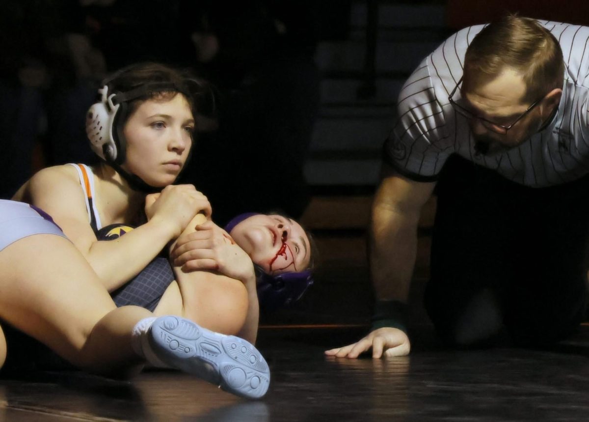 Nalani fights an intense pin during the dual against Thermopolis.