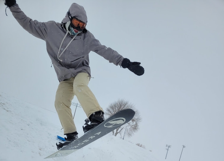 Truett Carter snowboards down Homesteader on the snow day last Monday. 