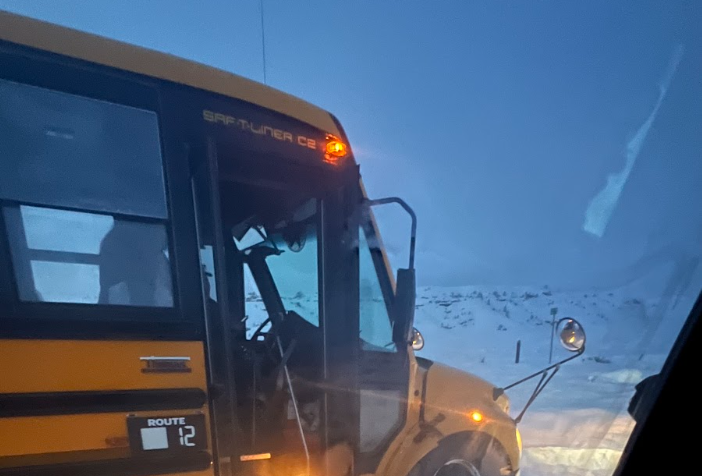 The PCSD1 Clark bus waits to be freed from the snow.