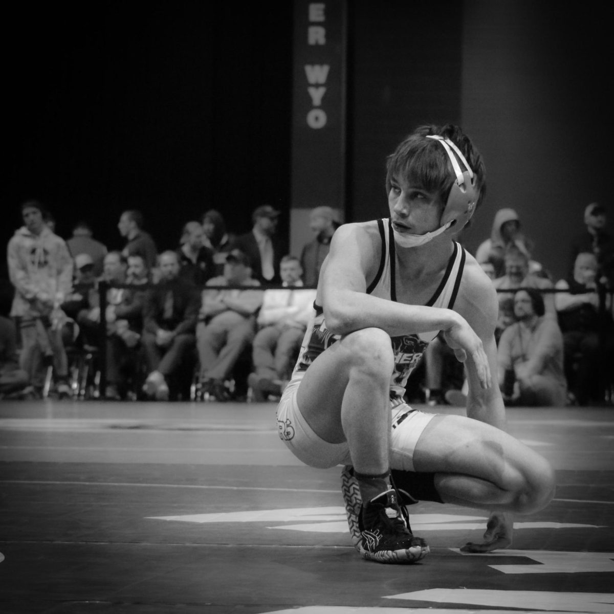 Senior Wyatt Nicholson takes a second to breathe during the 113-pound state championship match.