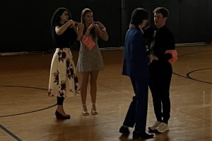 A romantic dance shared between Paul Cox and Jullian Frost as their dates watch.
