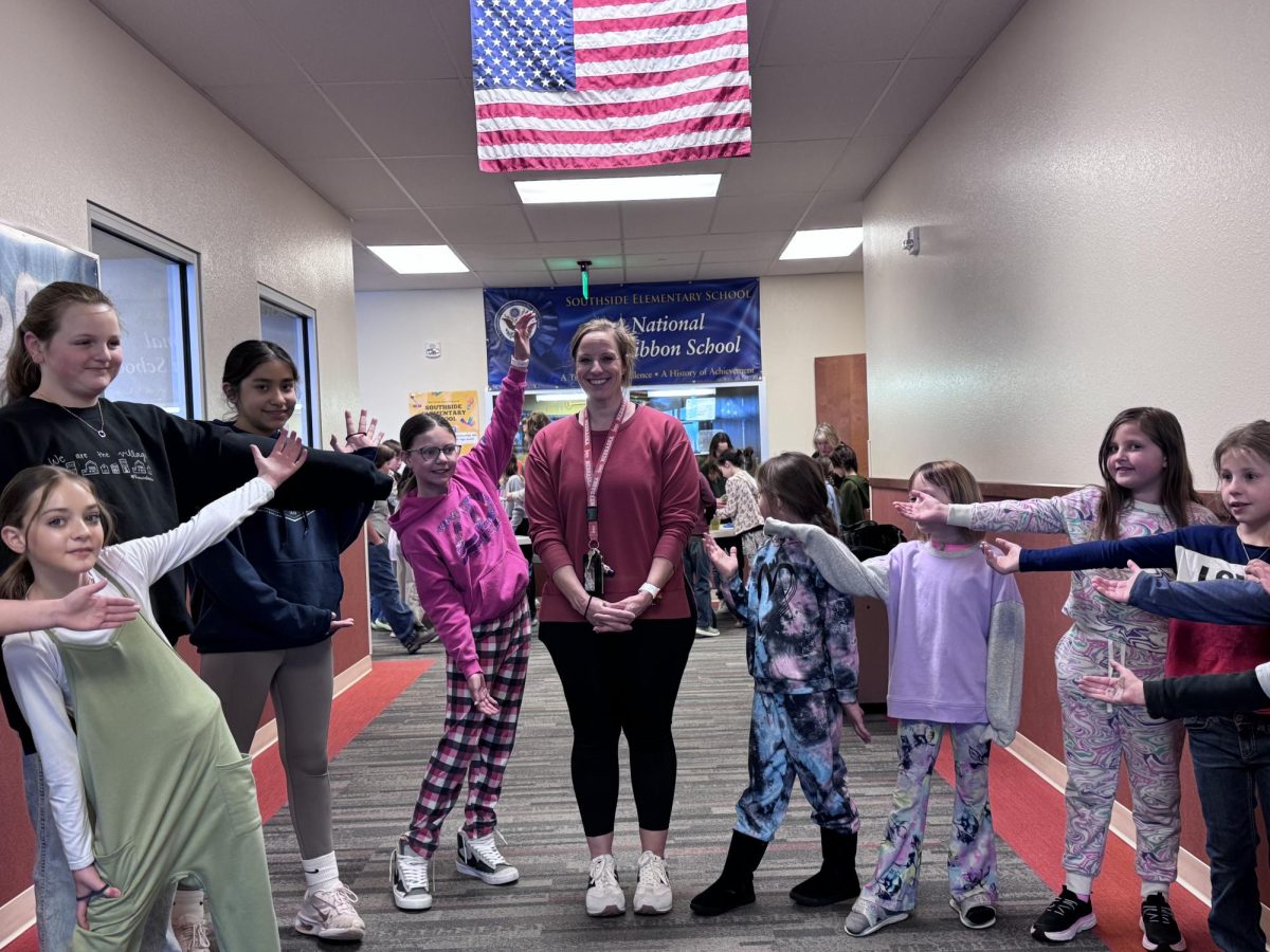 Kati Sears celebrates with her students after sharing about the award.