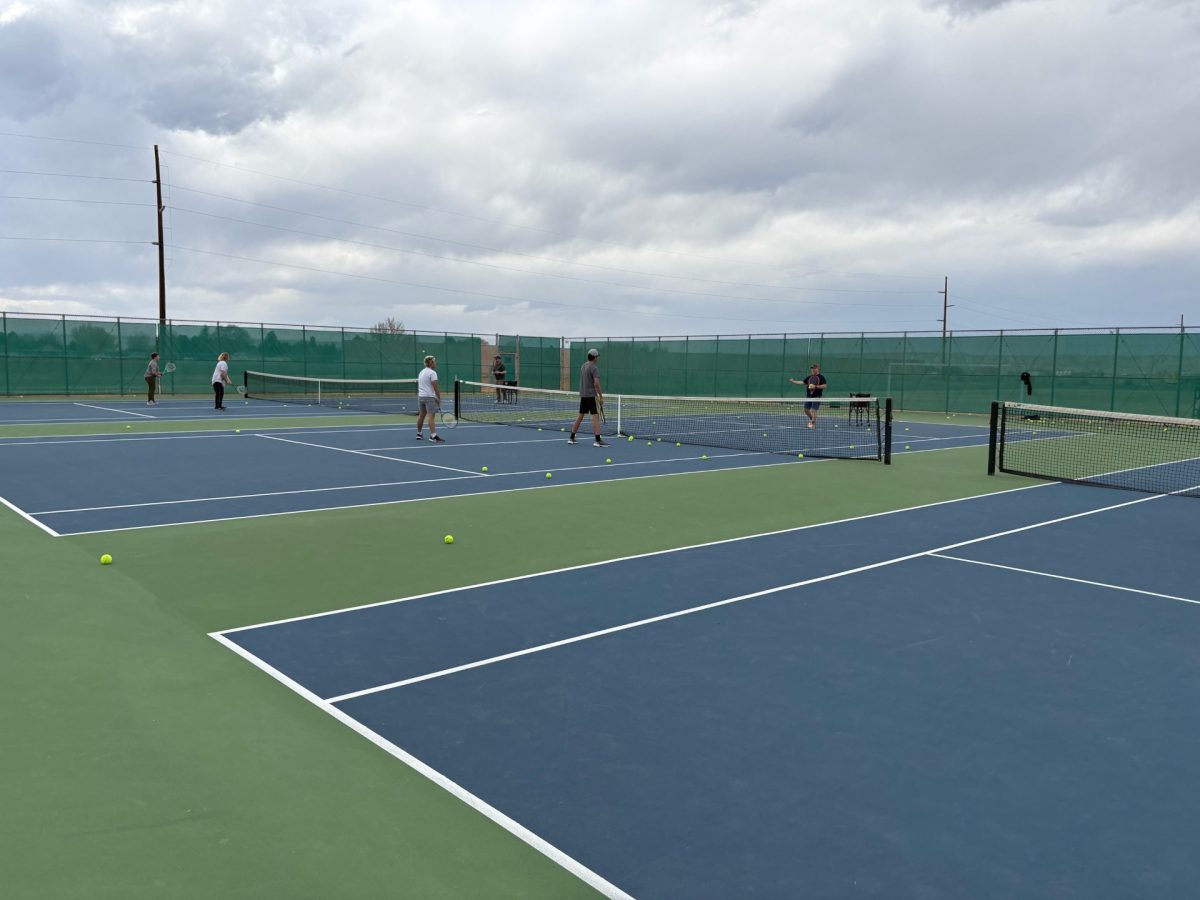 PHS tennis team practices their tennis skills through drills. 