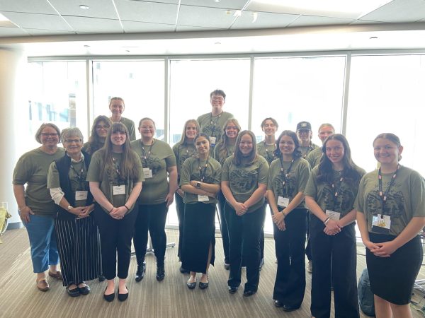 Powell High School SkillsUSA members pose for a group photo before continuing to compete.