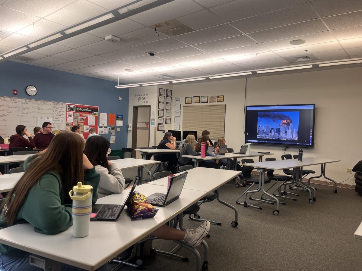Students view visuals of the attack on the Twin Towers to be reminded of the tragedy.