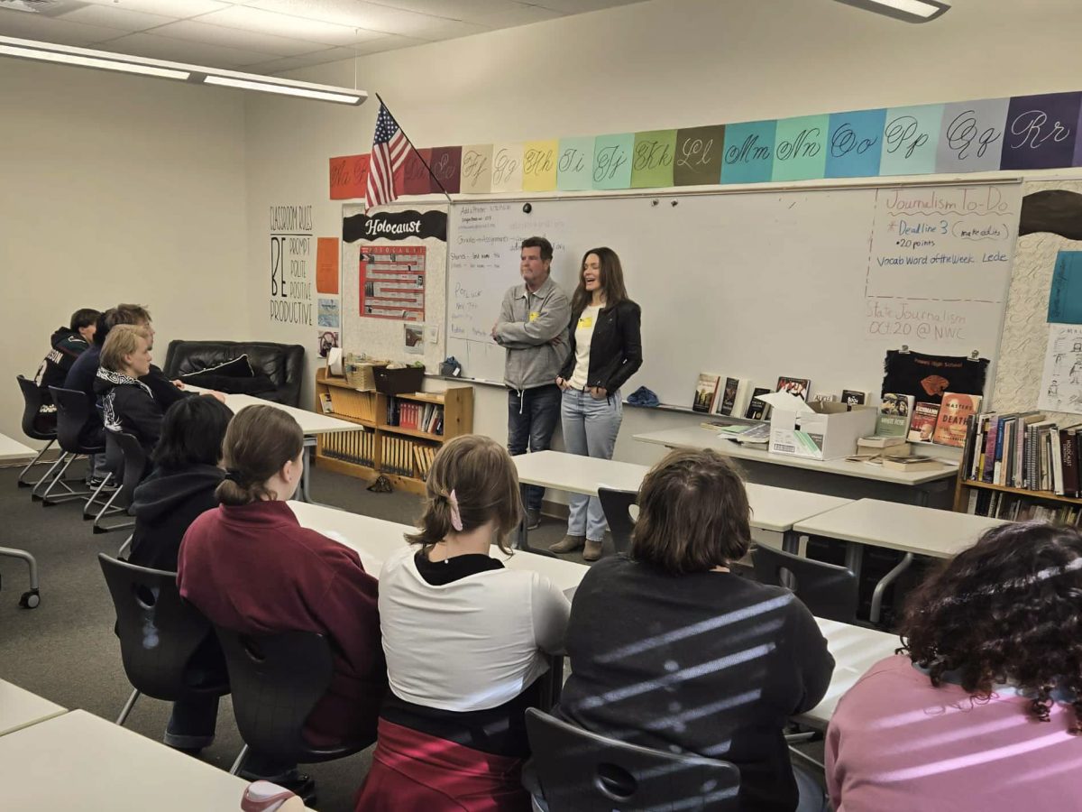 Actress Hannah Barefoot and producer Mark Matthis discuss the production of their film "Wyoming Christmas Carol" with PHS students.