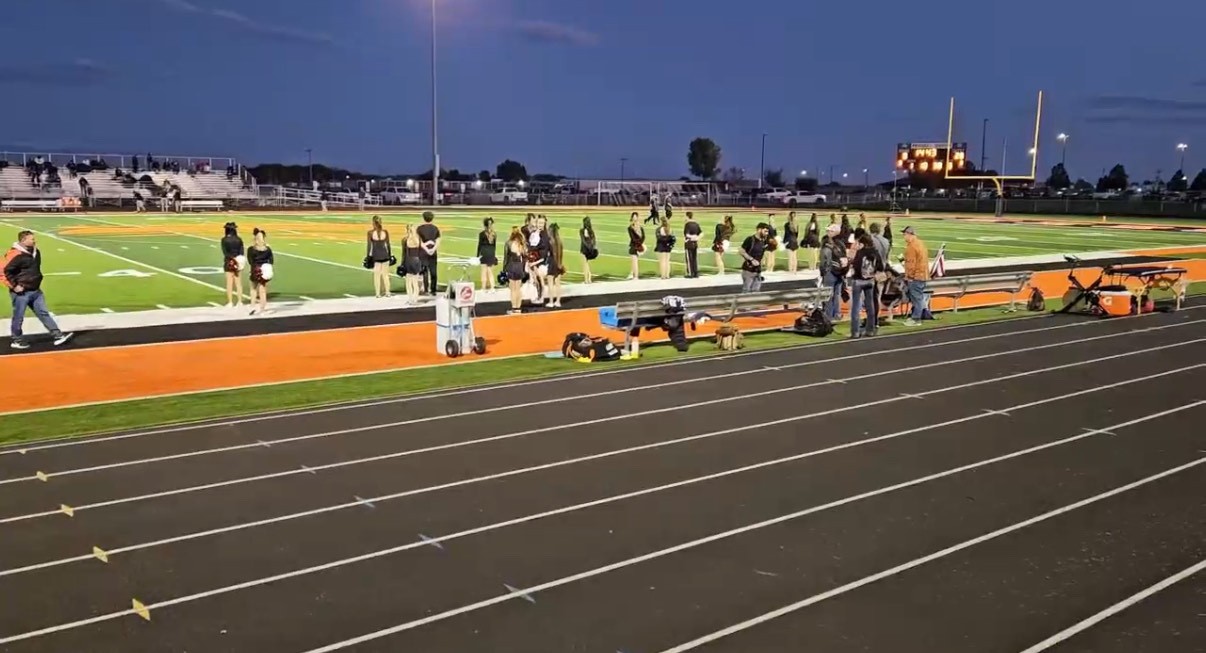 Moments before the halftime performance as the dance and cheer teams prepare. 