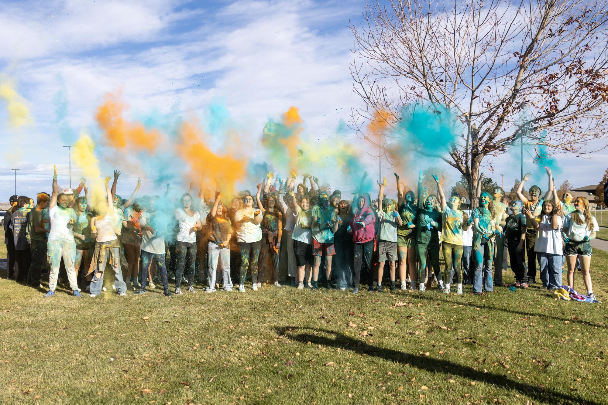 The freshmen erupt in celebration after their first high school color run.