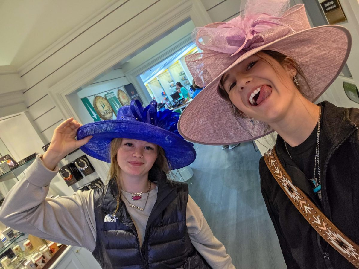 Alyssa Ely and Taylor Peters rock their Kentucky Derby Hats.