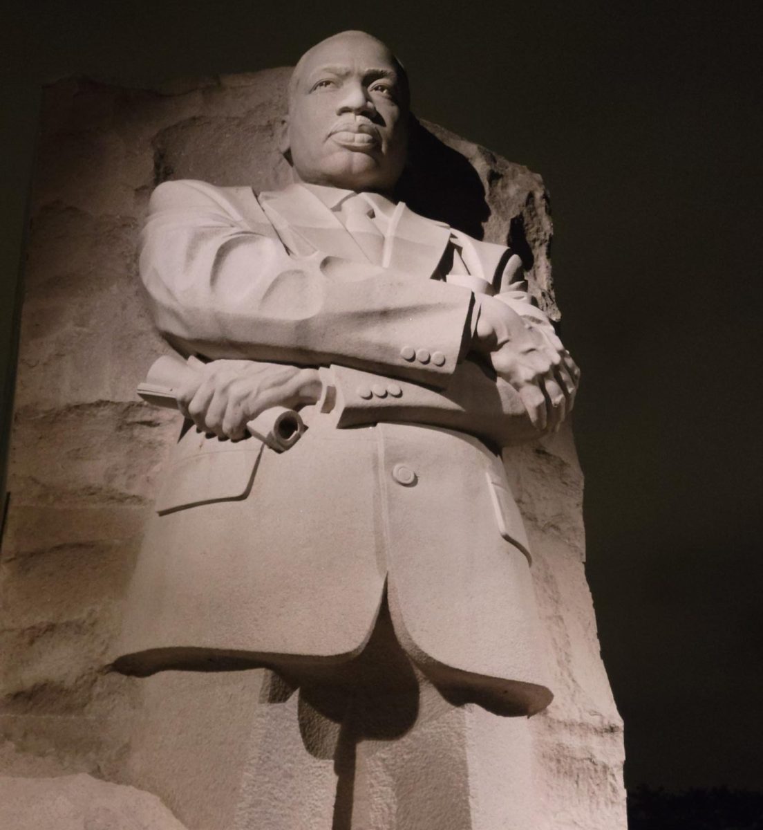 The regal visage of Martin Luther King Junior stands over visitors at his monument in Washington, D.C.