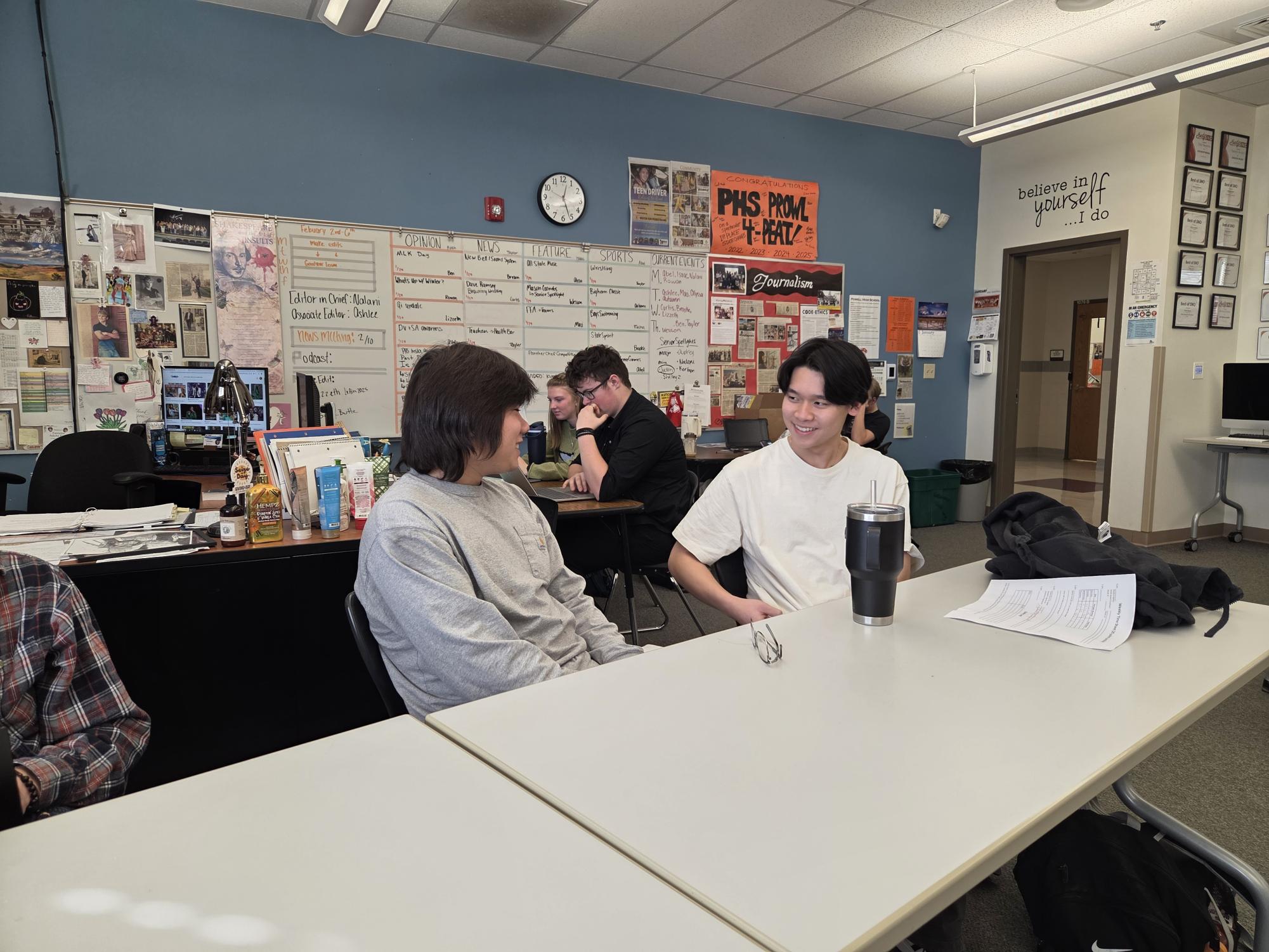 Phu Nyugen and Kitjanut “Bucky” Chaleamvisutkun chat in Mrs. Amy Moore's room during lunch.