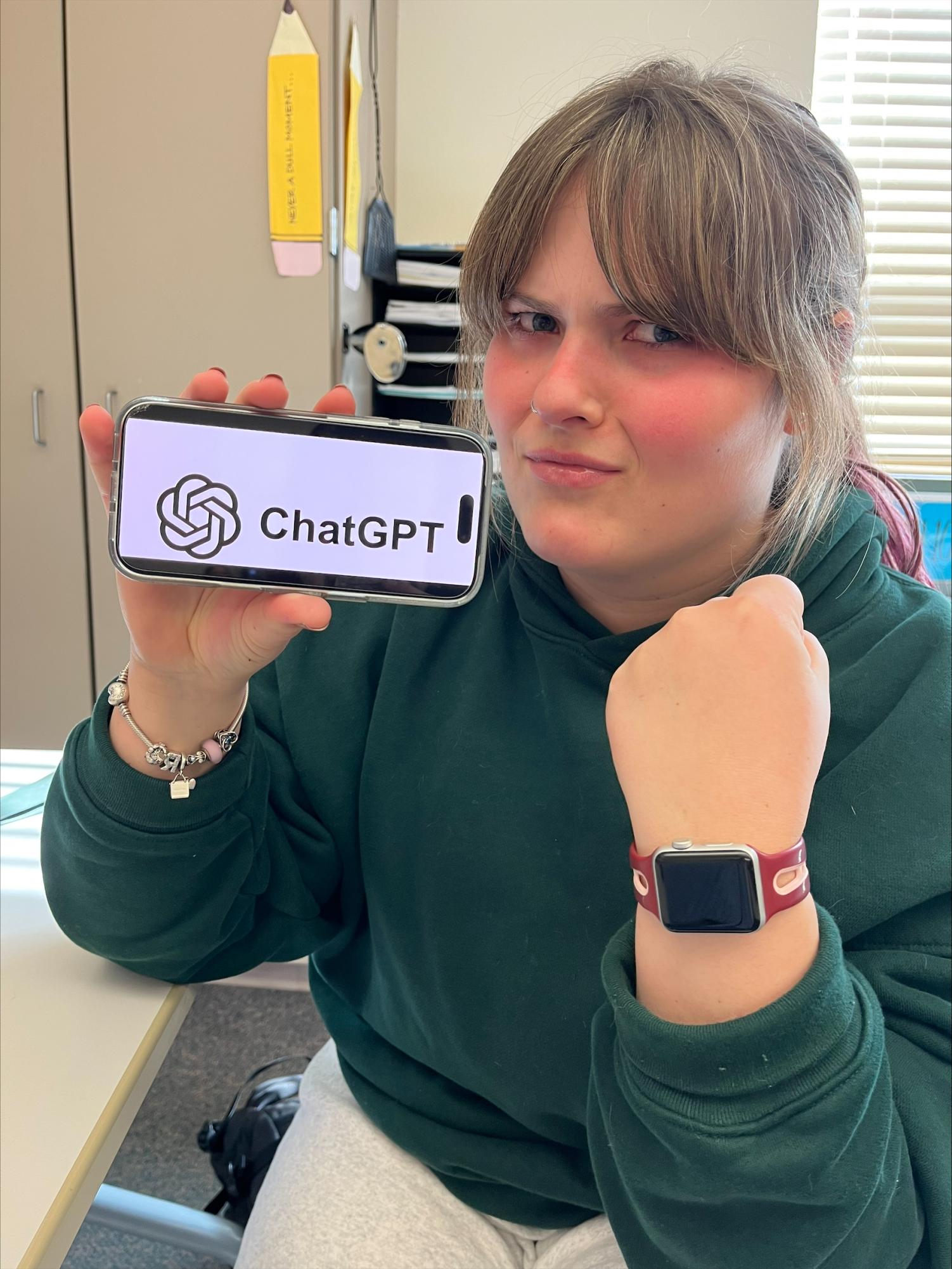 Junior Rowan Borcher appears visibly upset while pointing at the most well-known AI app, Chat GPT. 
