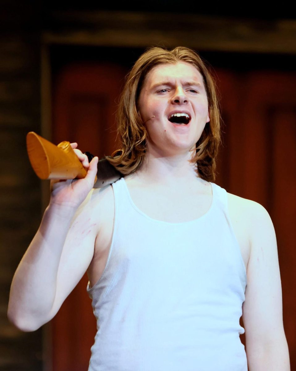 Justin Dusenberry belts out a tune in his role as Buck in the ”Bonnie and Clyde” musical.