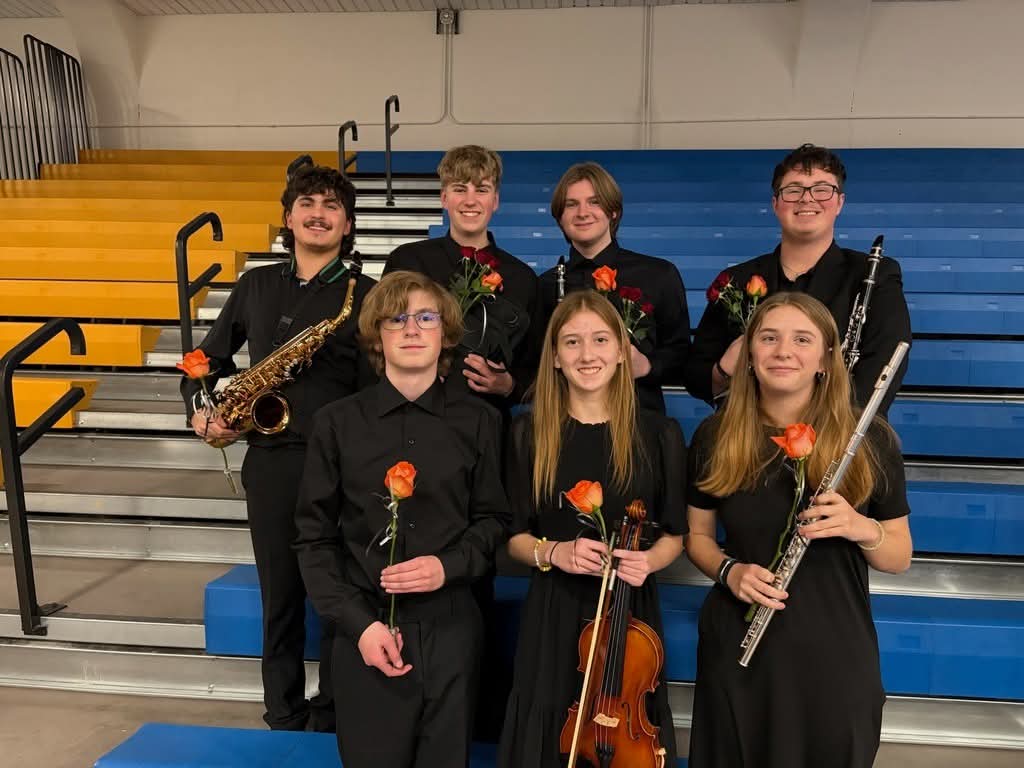 PHS All State Band members (Back Row) Memphis Solberg, Austin Sears, Justin Dusenberry, Curtis Muecke, (Front Row) Hayden Peters, Aubrey Kelley, and Lilly Pittman smile with joy after their performance