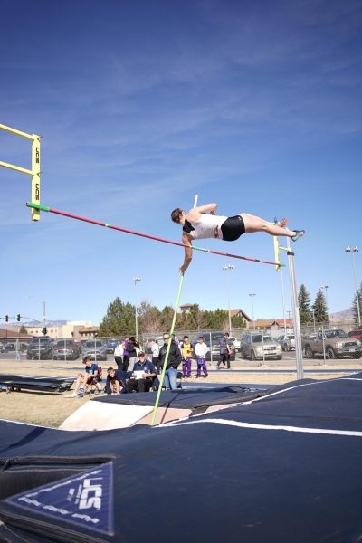 Kate Williams vaults over the bar to place first in the meet, jumping 8’6”