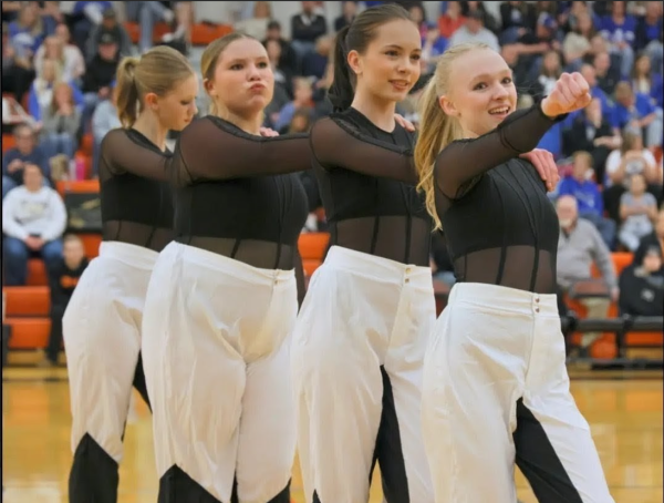 The PHS dance team performing their Hip-Hop dance at a basketball game (Left to Right; Alyson Morrow, Alexis Scott, Frida Reksten, Brooke Talmadge)