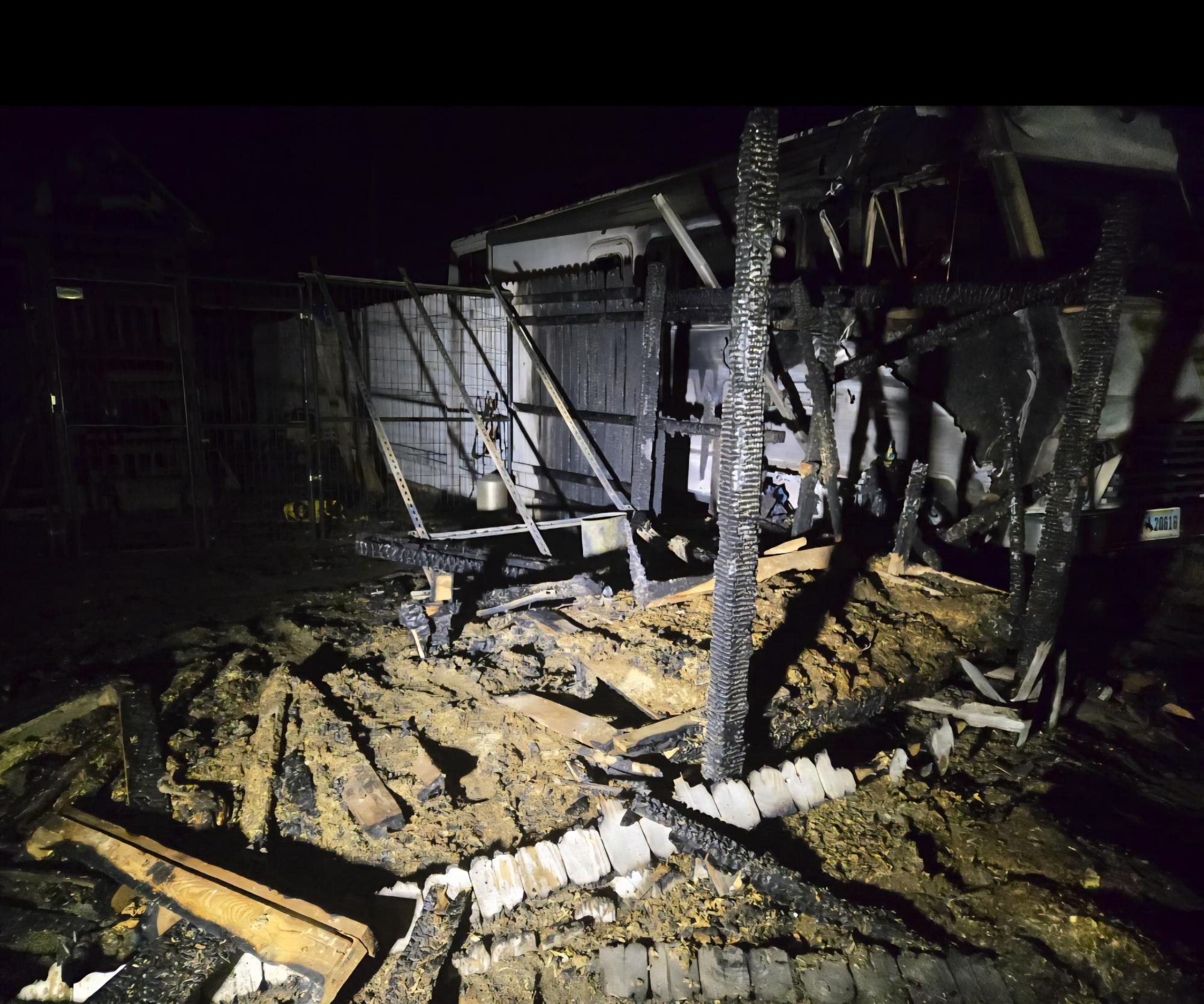 The charred remains of a backyard chicken coop and fire-gutted motorhome on Feb. 23 in Powell point to the continuation of the English Curse.
